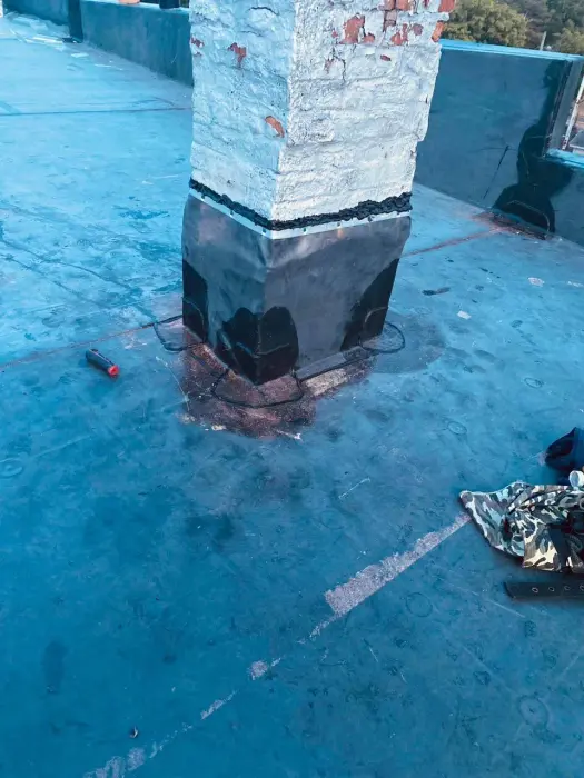 Damaged rooftop pillar with water leakage and water damage.